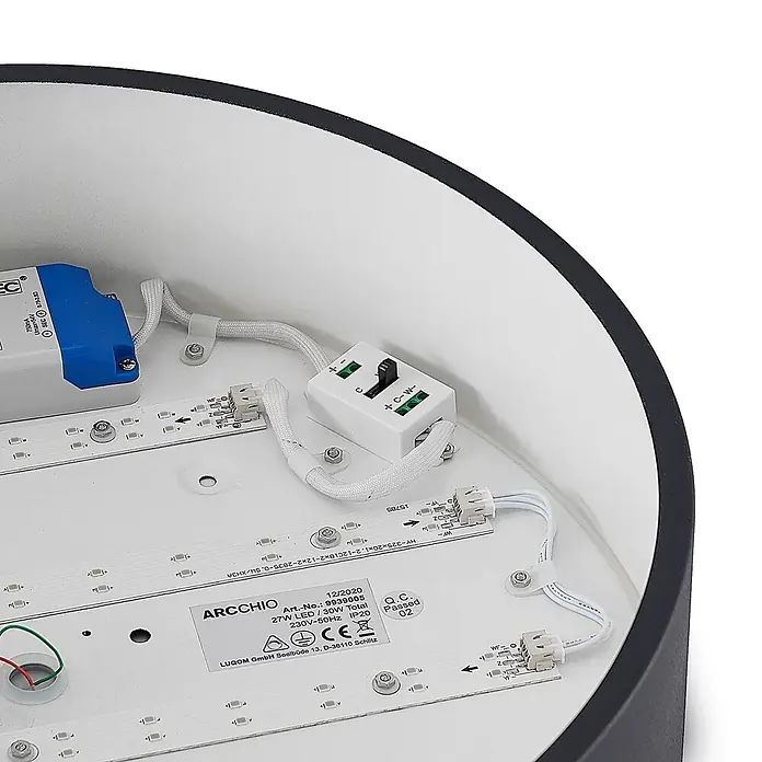 Arcchio Deckenleuchte Noabelle - schwarz, schwarz - Innenansicht einer runden LED-Leuchte mit weißen LED-Streifen, blauem Treiber und weißem CCT-Schalter auf weißer Basis.