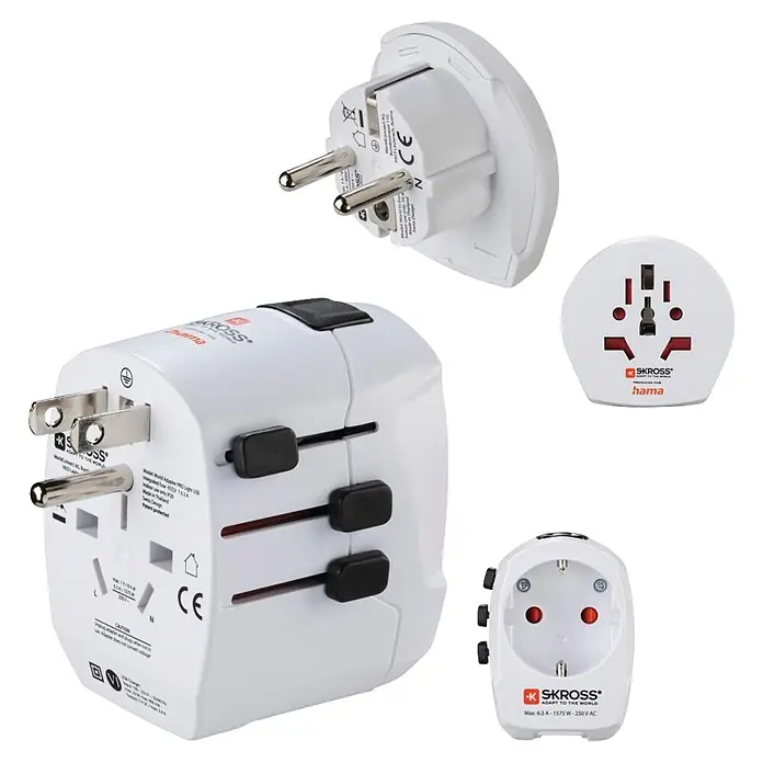 Hama Reiseadapter 00223474 "World Travel Pro Light USB" 3-polig 2x USB - Weiß - Weißer Universal-Reiseadapter mit austauschbaren Steckern, montiert und zerlegt zur Darstellung verschiedener internationaler Steckertypen und Buchsen.