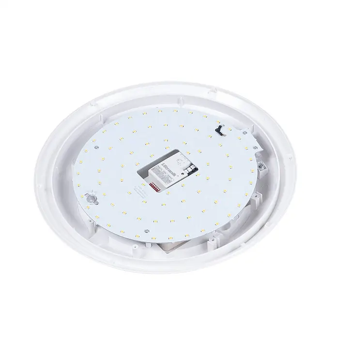 Lindby Außenwand- & Deckenleuchte Naira - weiß / opal, weiß / opal, IP65 - Innenansicht einer runden LED-Deckenleuchte mit weißer Platine, gelben LEDs und zentralem 'Ultranik'-Treiber im weißen Kunststoffgehäuse.