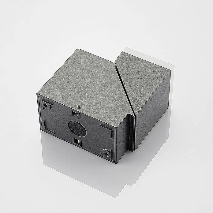 Lindby Außenwandleuchte Sally - schwarz, IP54 - Dunkelgraue, texturierte Außenwandleuchte mit geteiltem Design, das eine weiße Innenfläche und Befestigungspunkte zeigt.