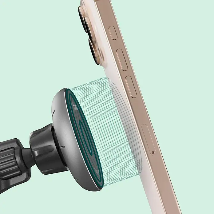 Hama Kfz-Smartphone-Halterung 15 W 201736 00201736 Ausgänge Induktionslade-Standard - Schwarz - Dunkelgraue magnetische Handyhalterung hält ein goldenes Smartphone mit sichtbaren Magnetlinien, die Ladung oder Befestigung anzeigen.