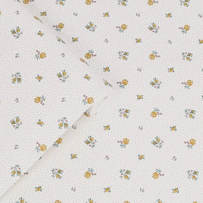 Laura Ashley Vliestapete Vliestapete Claudias Freund - Gelb, Floral - Tapetenrolle mit kleinen gelben Rosen, rosa Blüten, blaugrünen Blättern und grauen Punkten auf hellem Hintergrund.