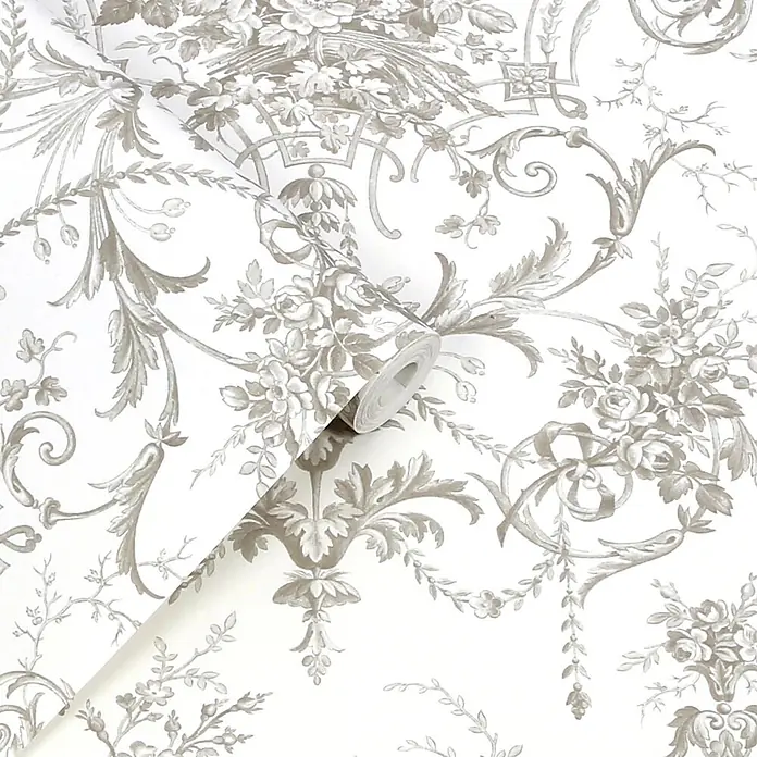 Laura Ashley Vliestapete Tuileries Französisch - Grau, Floral, 1.000 x 52 cm - Tapetenrolle mit hellgrauem, ornamentalem Blumenmuster.