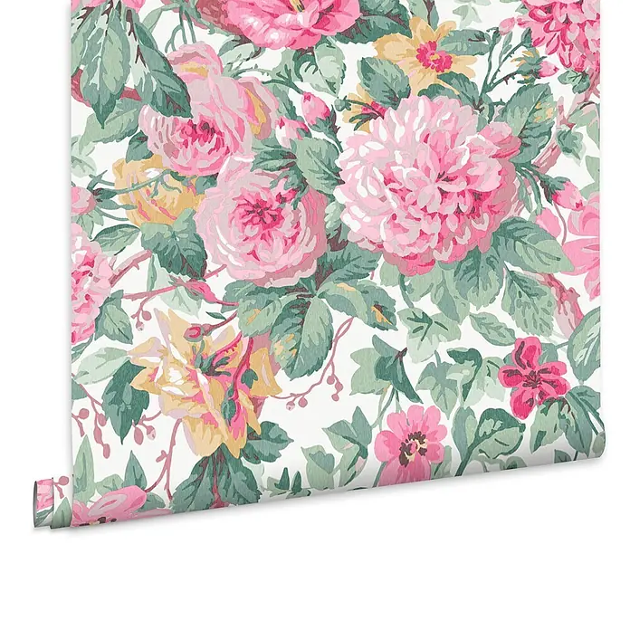 Laura Ashley Vliestapete Vliestapete Aveline - Rosa, Floral, 10 x 0,52 m - Florale Tapetenrolle mit rosa und gelben Blumen und grünen Blättern, teilweise abgerollt.