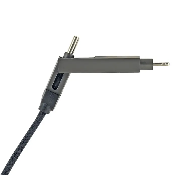 Schwaiger USB-Ladekabel 4-in-1 Multi-Ladekabel - Schwarz, Länge: 12 cm - Dunkelgrauer L-förmiger Adapter mit Metallstiften und geflochtenem Kabel.