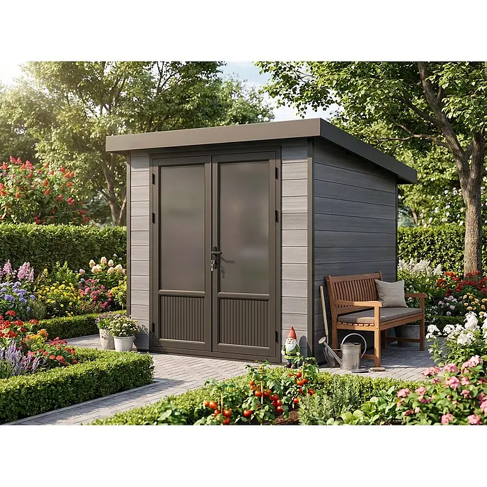 Fjordholz Gartenhaus Style DeLuxe 4,0 m² - Außenmaß inkl. Dachüberstand (B x T): 238 x 236 cm, Aluminium, Anthrazit/grau - Modernes dunkelgraues Gerätehaus aus Verbundmaterial mit Flachdach und dunklen Türen in einem Garten.