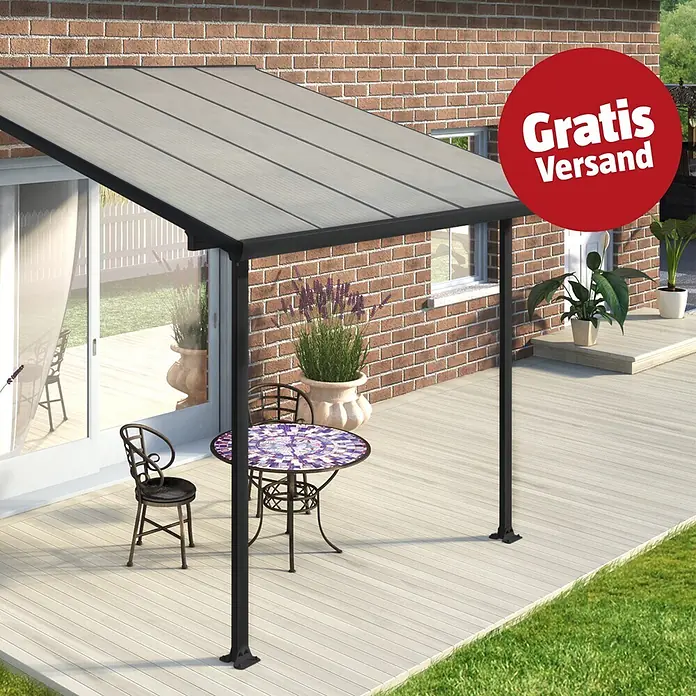 Solid Elements Terrassenüberdachung Martina - B x T: 305 x 300 cm, Anthrazitgrau, Polycarbonat, Transparent - Dunkelgraue Terrassenüberdachung mit transluzentem Dach an Backsteinhaus über Holzterrasse.