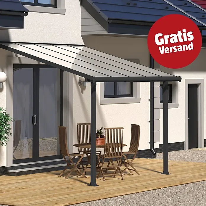Palram – Canopia Terrassenüberdachung Olympia - B x T: 307 x 300 cm, Anthrazitgrau, Polycarbonat, Transparent - Dunkelgraue Terrassenüberdachung mit transparentem Dach am Haus, über Holzdeck mit Möbeln. Gratis Versand.