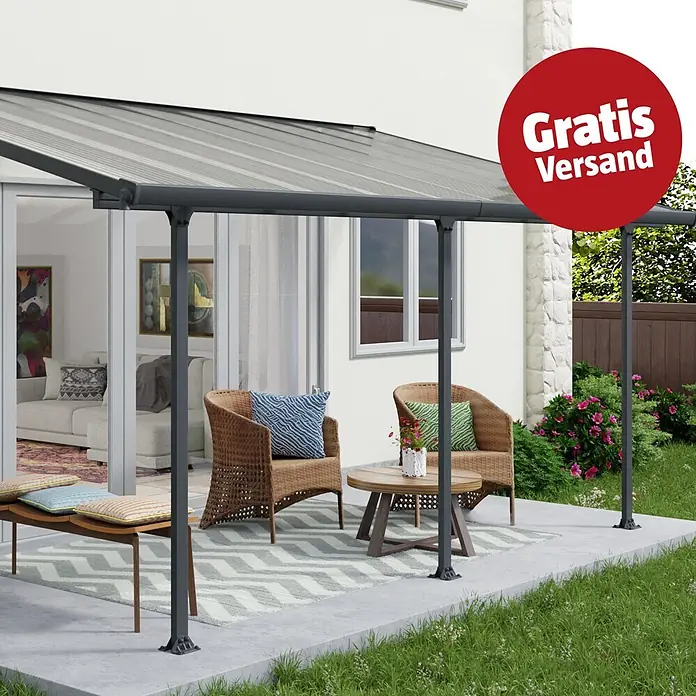 Terrassenüberdachung Tuscany LED - B x T: 546 x 300 cm, Anthrazitgrau, Polycarbonat, Transparent - Anthrazitfarbene Terrassenüberdachung mit lichtdurchlässigem Dach über einem Sitzbereich am Haus.