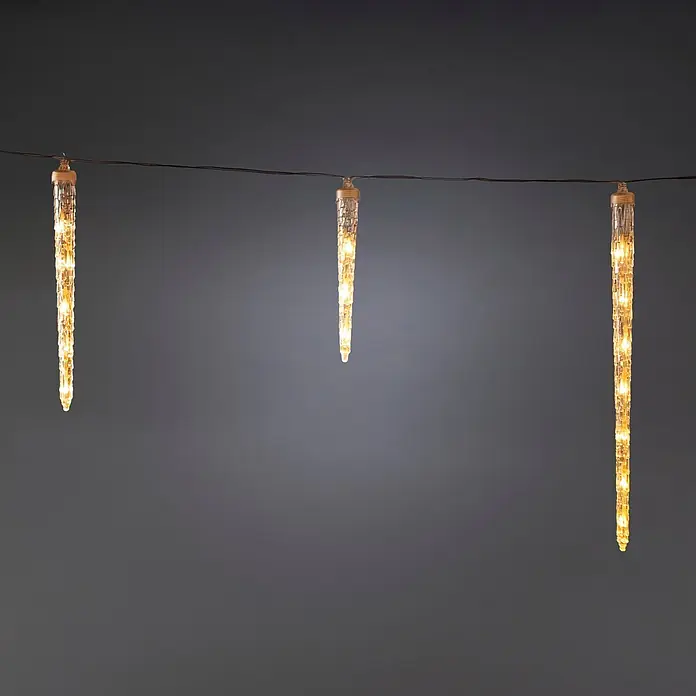 Konstsmide LED-Lichtervorhang Eiszapfen - Innen, 450 cm, Warmweiß, 80 Stk., Netzbetrieben - Lichterkette mit warmweißen LED-Eiszapfen aus strukturiertem, klarem Material.
