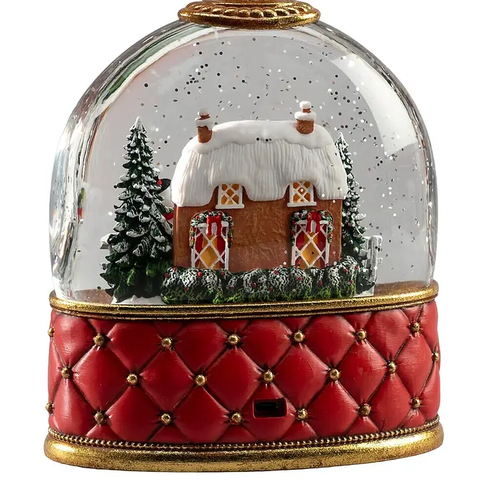 Konstsmide LED-Schneelaterne Schneemann mit Haus - Innen, Rot, 15,5 x 9 x 20 cm, Batteriebetrieben - Schneekugel mit rotem, gestepptem Sockel, zeigt Winterhäuschen mit Bäumen und Glitzer.