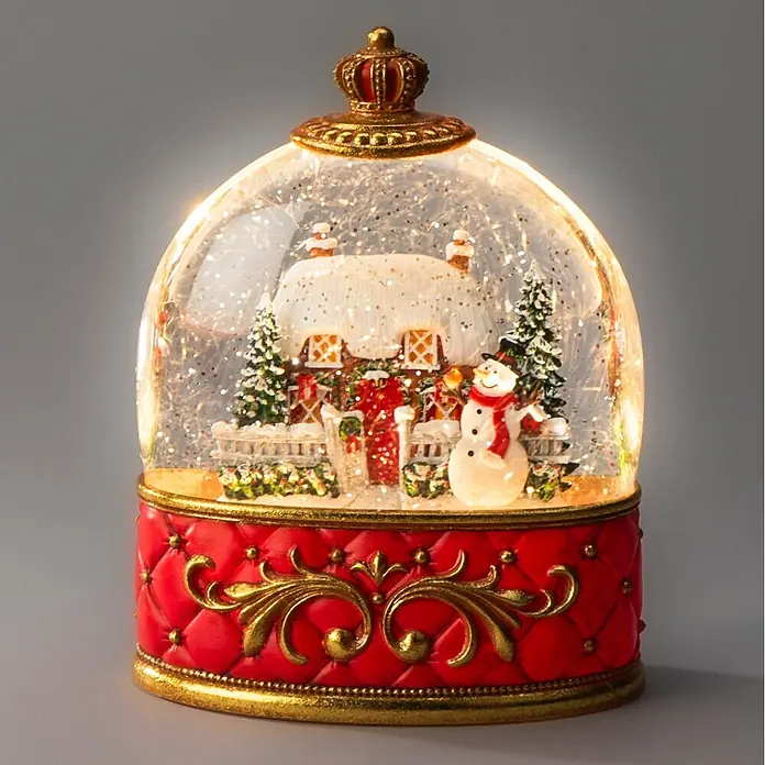 Konstsmide LED-Schneelaterne Schneemann mit Haus - Innen, Rot, 15,5 x 9 x 20 cm, Batteriebetrieben - Beleuchtete Weihnachts-Schneekugel mit festlichem Haus, Schneemann und Bäumen in rotem und goldenem Ziersockel.