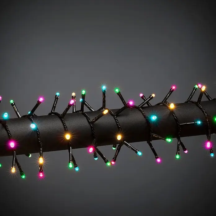 Konstsmide LED-Clusterlichterkette Pastell - Außen, Länge: 17,57 m, 640 Stk., Netzbetrieben - Mehrfarbige LED-Lichterkette mit Sterncheneffekt, um ein dunkles Rohr gewickelt.