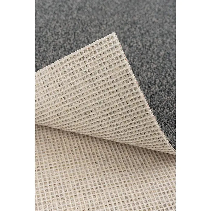 Bricoflor Teppichboden Meterware 3,5x4m, Schlinge meliert, grau - Schlinge, 100 % Polyamid (PA), grau - Heller, beigefarbener Antirutschteppichunterleger mit Gittermuster, teilweise angehoben.