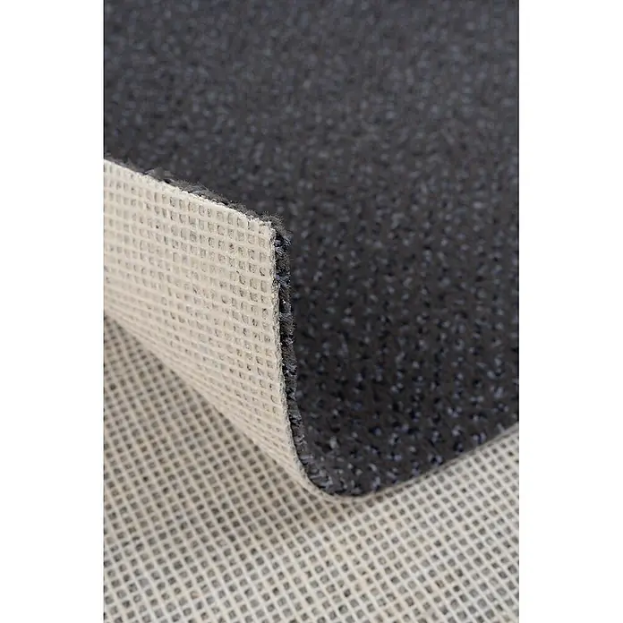 Bricoflor Teppichboden Meterware Velours gemustert, dunkel-grau, 250 x 400 cm - Breite: 400 cm, Velours, 100 % Polyamid (PA), dunkel-grau - Dunkelgrauer Teppich, teilweise gerollt, zeigt eine beige, rutschfeste Gitterunterseite.