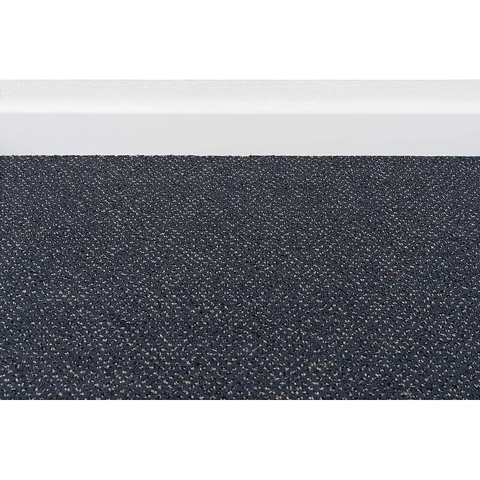 Bricoflor Teppichboden Meterware 4x4m, Velours gemustert, dunkel-grau anthrazit - Velours, 100 % Polyamid (PA), dunkel-grau anthrazit - Blauer und beigefarbener gesprenkelter Teppich auf einem Boden neben einer weißen Fußleiste.