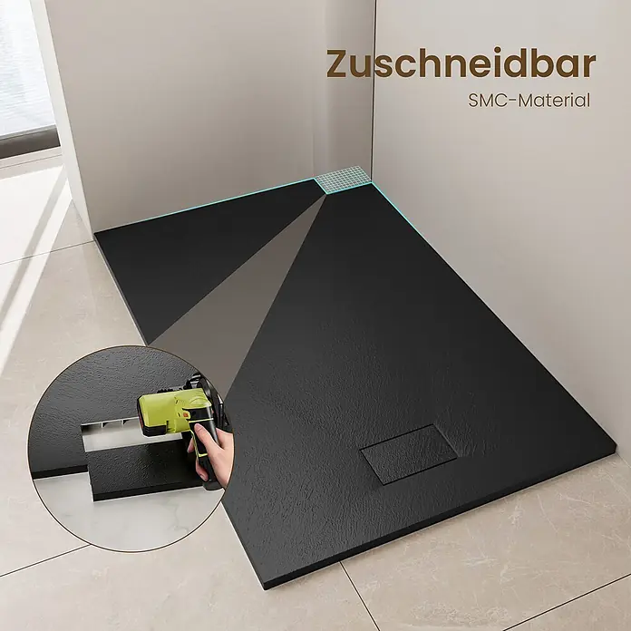 Emke Duschwanne ST - Kunststoff, Schwarz - Schwarze, zuschneidbare SMC-Duschwanne im Bad, mit Detailaufnahme des Zuschneidens.