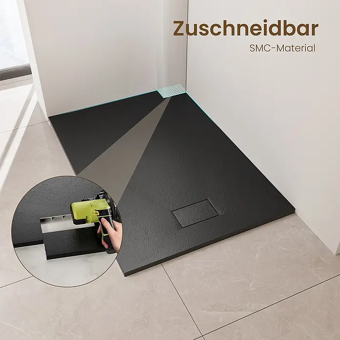Emke Duschwanne ST - Kunststoff, Schwarz - Schwarze SMC-Duschwanne, beim Zuschneiden für individuelle Passform in einer Badezimmerecke gezeigt.