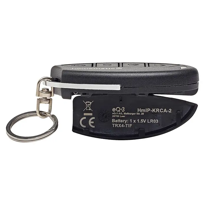 Homematic IP Fernbedienung Schlüsselbundfernbedienung Alarm HmIP-KRCA-2 - Schwarz - Schwarze Funkfernbedienung mit Metall-Schlüsselanhänger, teilweise geöffnet, zeigt Batteriedetails.