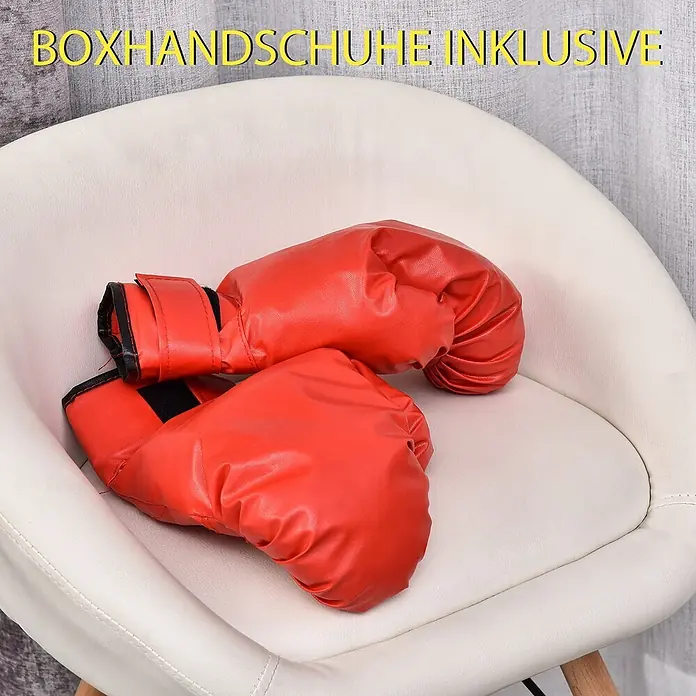 Homcom Boxsack - Ø x L: 48 x 48 cm, Schwarz, Rot - Rote Boxhandschuhe aus Kunstleder, auf einem weißen Stuhl liegend.