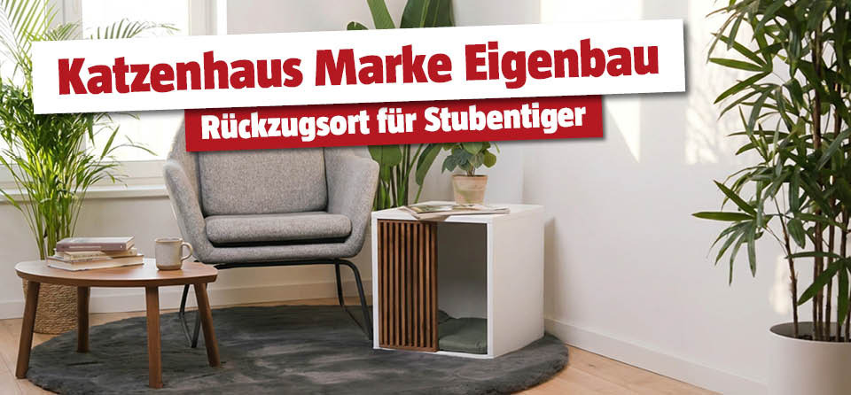 Selbstgemachtes Katzenhaus neben der Leseecke