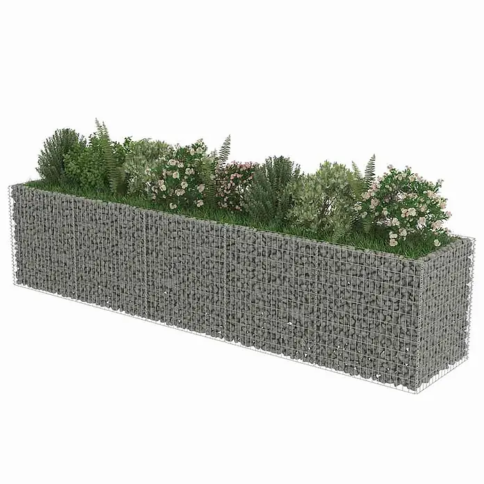 Furnicato Gabionen-Hochbeet - 450 x 90 x 100 cm, Stahl - Langer Gabionen-Pflanzkasten mit grauen Steinen, gefüllt mit grünen Büschen, Farnen und rosa Blütenpflanzen.
