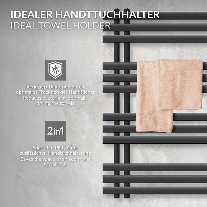LuxeBath Badheizkörper Design Handtuchheizkörper Handtuchwärmer Mittelanschluss Radiator - B x H: 60 x 100 cm, Anthrazit - Ein schwarzer Handtuchheizkörper an einer Wand mit zwei pfirsichfarbenen Handtüchern zum Trocknen.