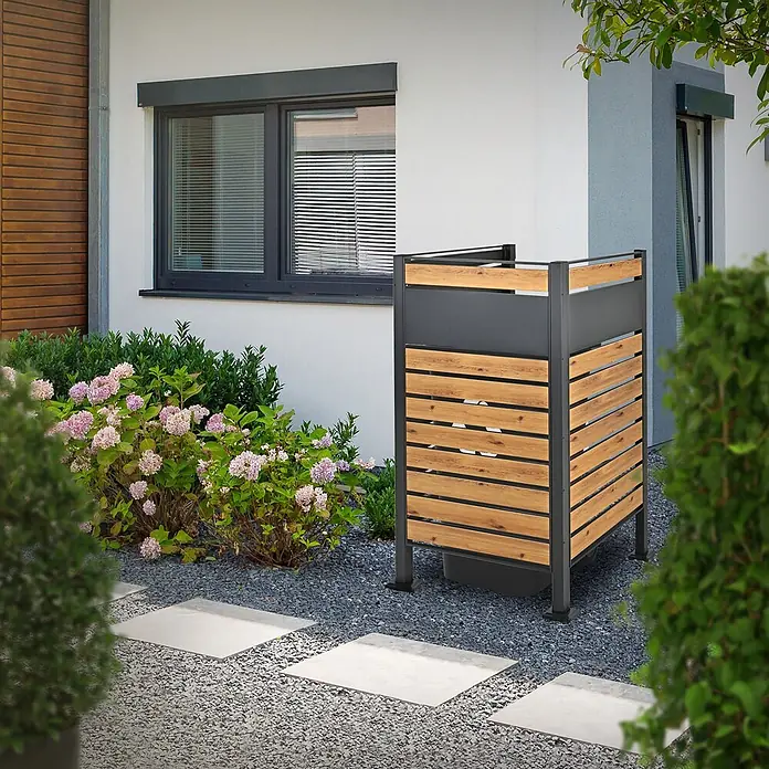 ML-Design Mülltonnenbox Mülltonnenzaun Mülltonnenabtrennung mit 1 Zaunelement, erweiterbar - Stahl, Anthrazit, Braun - Outdoor-Mülltonnenbox aus dunkelgrauem Metall und Holzlatten, im modernen Garten platziert.