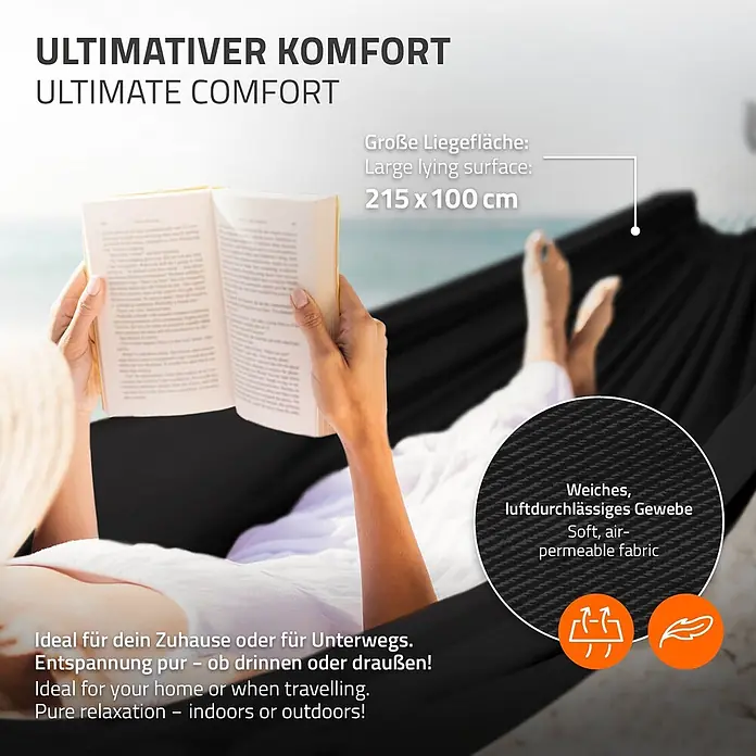 ML-Design Hängematte XXL Hängesessel Schwarz mit Tragetasche und Ständer für Garten/Balkon - Stahl, Schwarz, Passend für: Erholung, Lesen, Entspannen - Person entspannt lesend in schwarzer, weicher, luftdurchlässiger Hängematte. Große Liegefläche für ultimativen Komfort, ideal für Zuhause oder unterwegs.