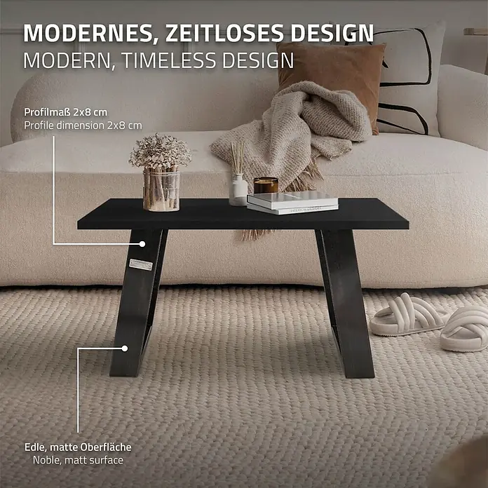 ML-Design Tischgestell Bankkufen Schräge Metall Bankbeine Bankgestell - Stahl - Schwarzer Couchtisch mit matter Oberfläche und robusten 2x8 cm Profilbeinen auf einem Teppich im modernen Wohnzimmer.