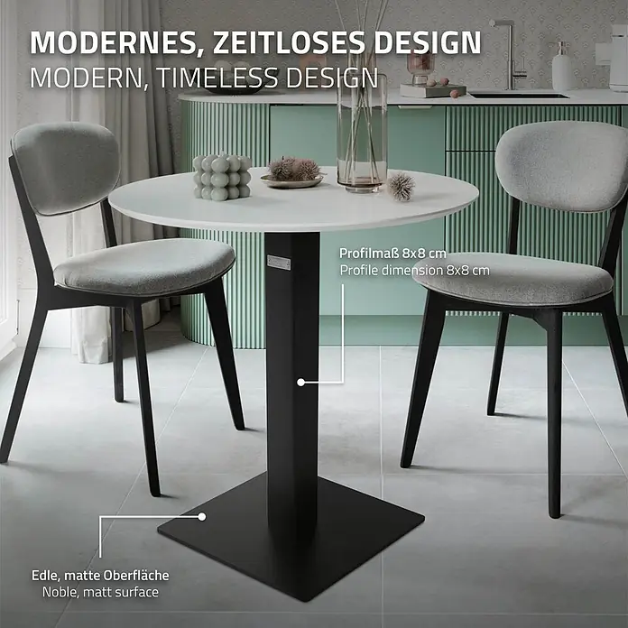 ML-Design Tischgestell mit Bodenplatte aus pulverbeschichteteter Stahl - Stahl - Moderner runder Tisch mit matter schwarzer Basis und zwei grauen Stühlen in einer Küche.