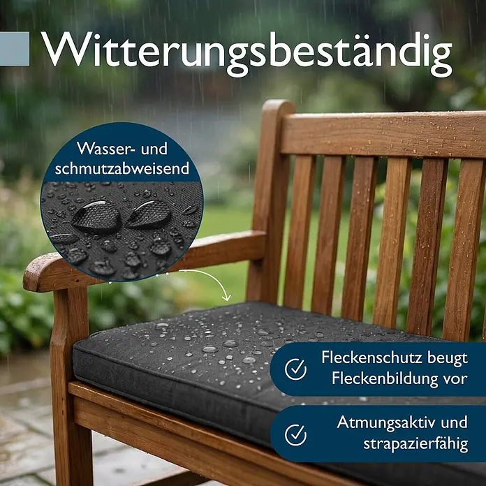 Beautissu Bankauflage Calme BK - Bankauflage, 1 Stk., L x B x H: 140 x 40 x 5 cm, Polypropylen, Graphitgrau - Dunkelgraues Outdoor-Kissen auf einer Holzbank, mit Wassertropfen, die den wetterfesten und wasserabweisenden Stoff hervorheben.