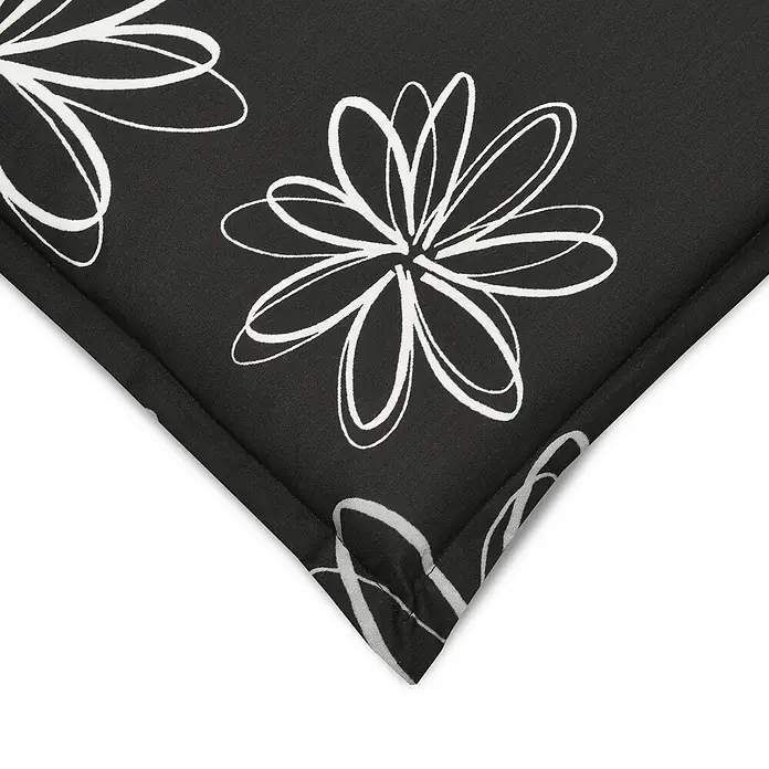 Beautissu Sitzauflage Flores - Hochlehner, 1 Stk., L x B x H: 120 x 50 x 6 cm, Baumwolle, Polyester, Mehrfarbig - Schwarzer, gesteppter Stoff mit weißem Blumenmuster, eine Ecke gefaltet.