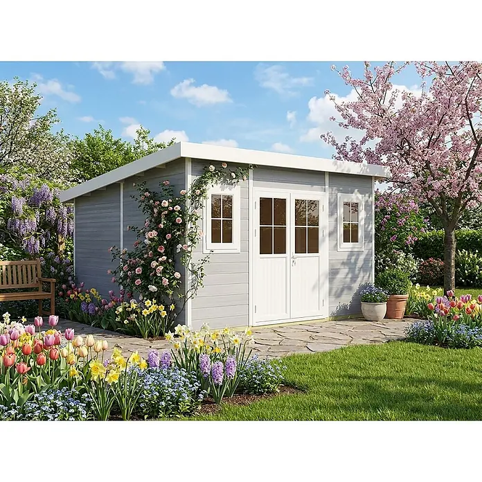Fjordholz Gartenhaus Nexo White 15,0 m² - Außenmaß inkl. Dachüberstand (B x T): 428,5 x 423 cm, Aluminium, Grau / Weiß - Hellgraues Gartenhaus mit weißem Besatz, Doppeltüren und mehreren Fenstern, in einem blühenden Frühlingsgarten.
