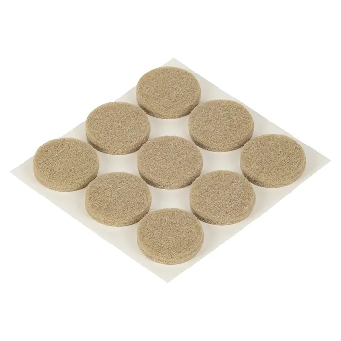 Fix-o-moll Filzgleiter - Durchmesser: 25 mm, Kleben, 9 Stk., Weiß - Neun runde, hellbraune Filzgleiter.