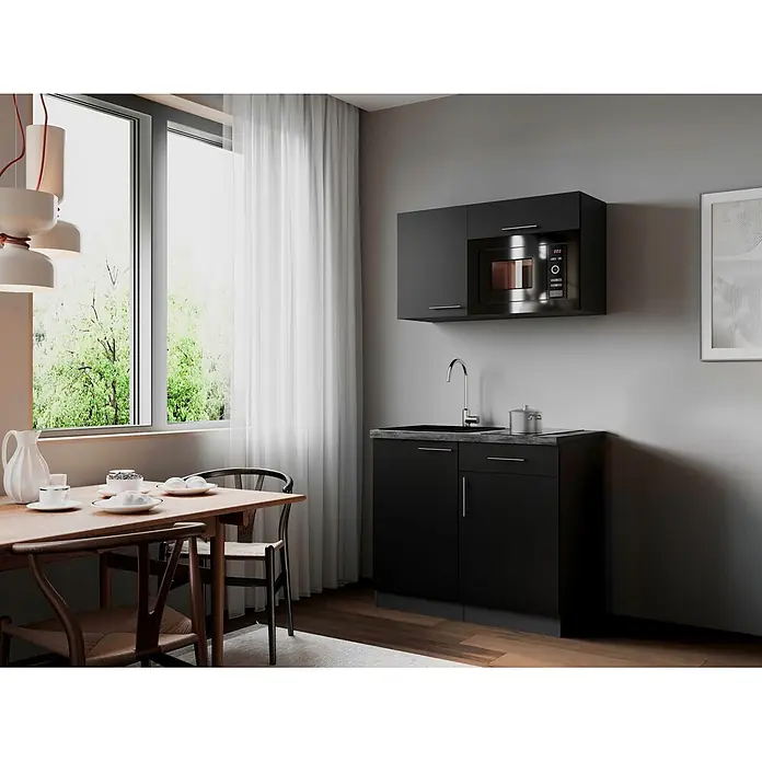 Respekta Oliver Miniküche - Breite: 100 cm, Schwarz, Kochfeld | Mikrowelle - Kompakte schwarze Küchenzeile mit integrierter Mikrowelle, Spüle und Schränken, in einem hellen Essbereich mit Holztisch.