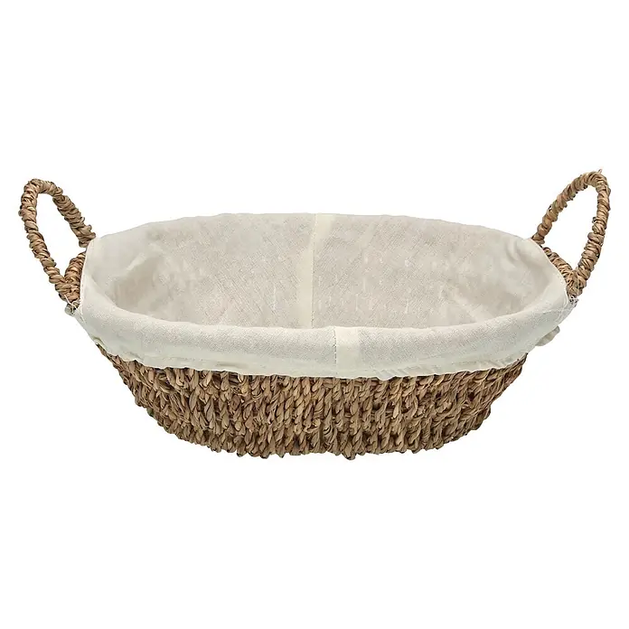 Versa Cesta - L x An x Al: 27 x 21 x 8 cm, Ovalada, Blanco - Cesta redonda trenzada de material natural con forro de tela claro y dos asas.
