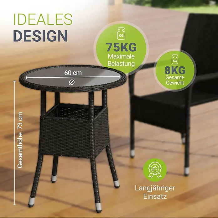 Juskys Gartentisch rund Yoro - Ø x H: 60 x 73 cm, Polyrattan, Schwarz - Dunkelbrauner Rattan-Beistelltisch mit Glasplatte und Ablage, auf Holzterrasse neben Stuhl.