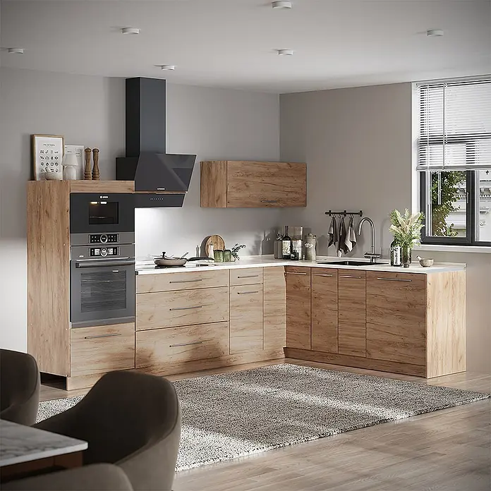 Vicco Eckküche - B x T: 287 x 51,6 cm, Goldkraft Eiche, Ohne Elektrogeräte - Moderne Küche mit hellen Holzoptik-Schränken, weißer Arbeitsplatte und dunklen Einbaugeräten in L-Form.