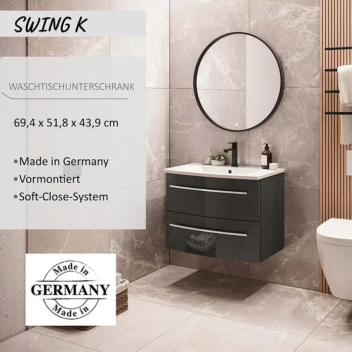 Camargue Swing K Waschtischunterschrank - B x T x H: 69,4 x 43,9 x 51,8 cm, Grafit, Farbe Griff: Chrom - Dunkelgrauer wandhängender Waschtischunterschrank mit weißem Waschbecken, zwei Schubladen und rundem Spiegel im Bad.