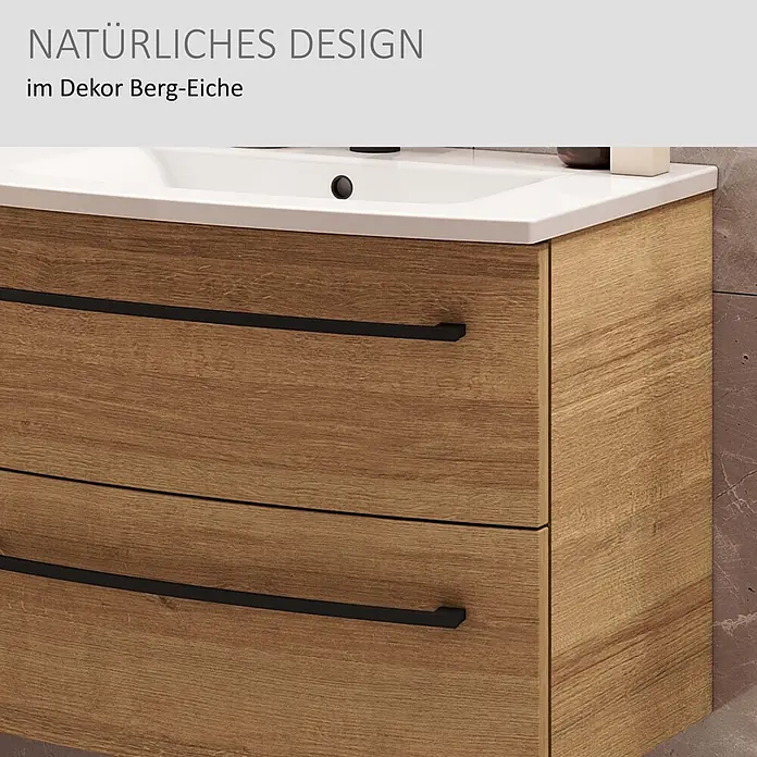 Camargue Swing K Waschtischunterschrank - 694 x 439 x 518 mm, Berg Eiche, Farbe Griff: Schwarz - Waschtischunterschrank in Berg-Eiche Dekor mit weißem Waschbecken und zwei Schubladen mit schwarzen Griffen.