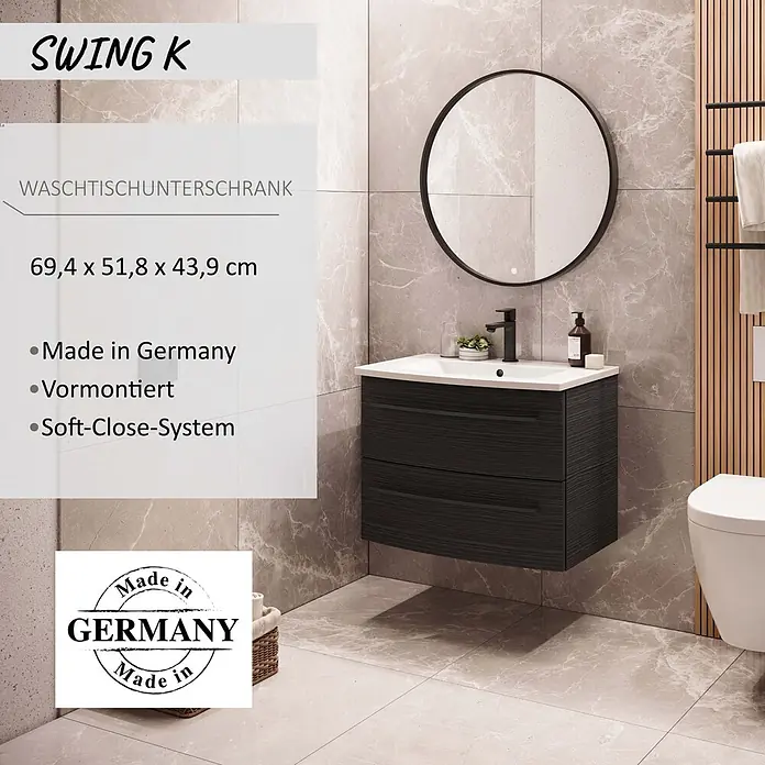 Camargue Swing K Waschtischunterschrank - 69,4 x 43,9 x 51,8 cm, Dark Oak, Farbe Griff: Schwarz - Dunkelgrauer, holzstrukturierter Waschtischunterschrank mit zwei Soft-Close-Schubladen und weißem Waschbecken, montiert unter einem schwarzen Rundspiegel.