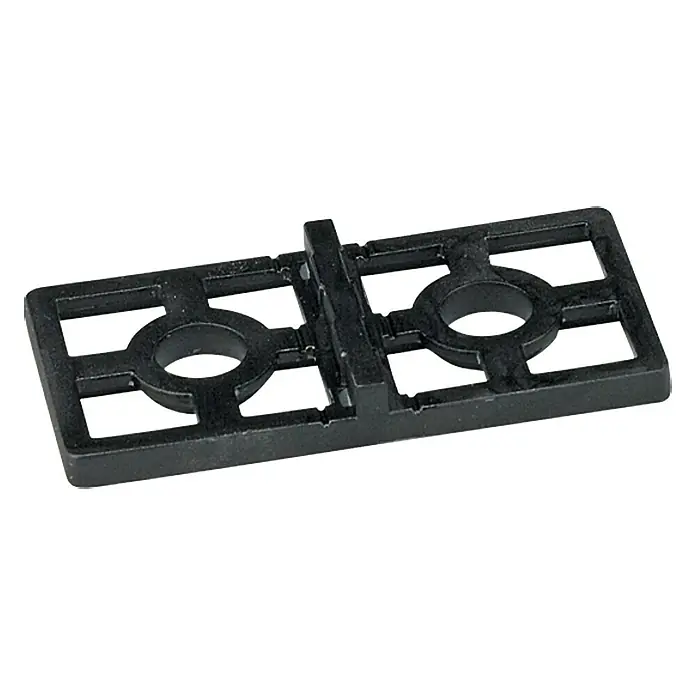 Distanz-Abstandshalter - 50 Stk., L x B: 8 x 4 cm - Schwarzes Kunststoffteil mit Löchern und rechteckigen Aussparungen, verbunden durch einen Mittelsteg.