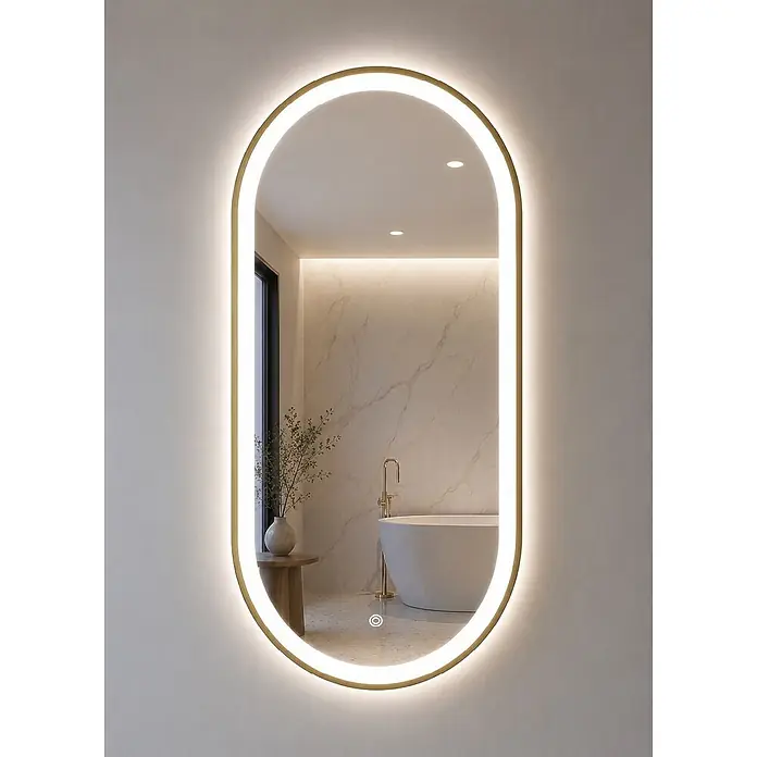 Cordia Lichtspiegel - 50 x 100 cm, Gold - Ein ovaler, LED-beleuchteter Spiegel mit goldenem Rahmen, der ein modernes Badezimmer mit warmem Licht und elegantem Design aufwertet.