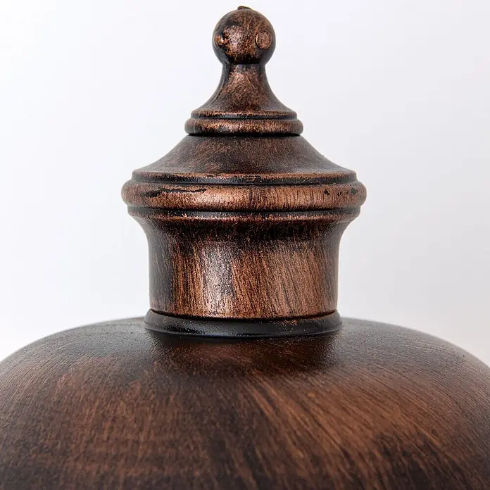 Orion Leuchten Außenwandleuchte Kenzo - 60 W, Schwarz, Klar, IP44 - Dekorativer Knauf mit antikem Bronzefinish. Er hat ein verziertes Design und eine gealterte Textur.