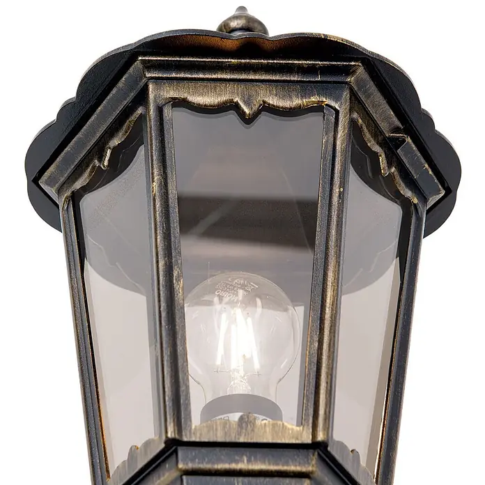 Orion Leuchten Außenwandleuchte Puchberg - 60 W, Schwarz, Klar, IP43 - Klassische Außenlaterne oben mit schwarz-goldenem Metallrahmen, klarem Glas und LED-Glühbirne.