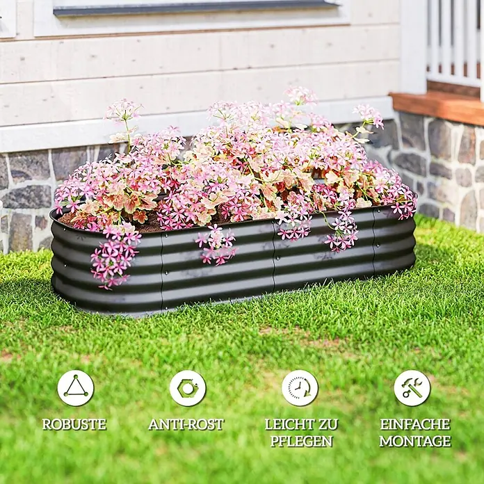 SONNENH Hochbeet Modulares - Stahl, dunkelgrau - Ein dunkles, gewelltes Hochbeet aus Metall, gefüllt mit rosa Blumen.
