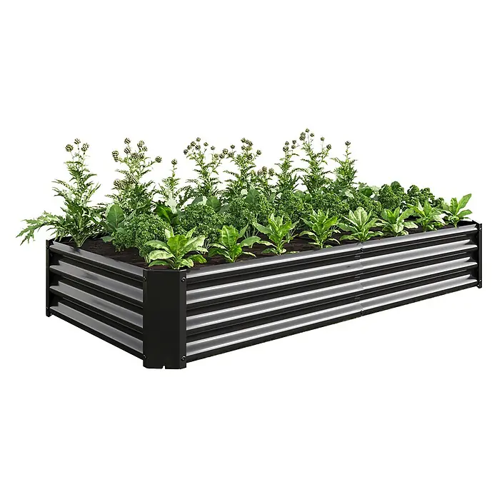 SONNENH Hochbeet bodenlos - Stahl, anthrazit - Schwarzes, gewelltes Hochbeet aus Metall mit Erde und grünen Pflanzen gefüllt.