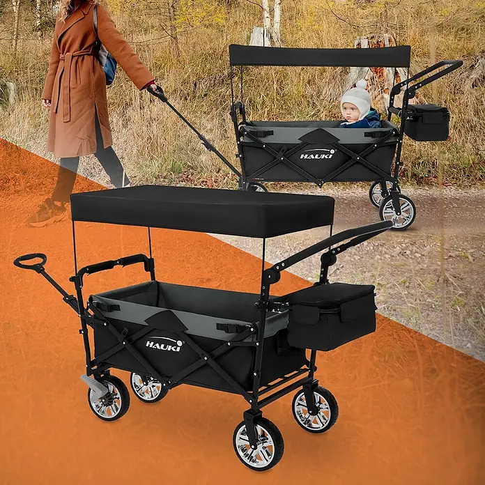 Hauki Bollerwagen Handwagen Transportwagen faltbar klappbar mit Bremse Dach und Tasche - L x B x H: 196 x 56 x 99 cm - Schwarzer und grauer Faltwagen mit Verdeck, auf einem Weg mit Kind und als Produktabbildung dargestellt.