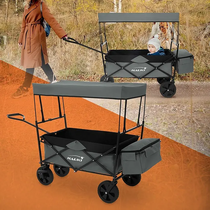 Hauki Bollerwagen Handwagen Transportwagen faltbar klappbar mit Bremse Dach und Tasche - L x B x H: 170 x 53 x 104 cm - Grauer Bollerwagen mit Dach, mit Kind im Einsatz auf einem Weg und allein gezeigt.